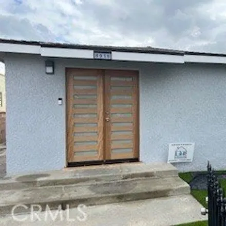 Buy this 3 bed house on 8966 Mettler Avenue in Los Angeles, CA 90003