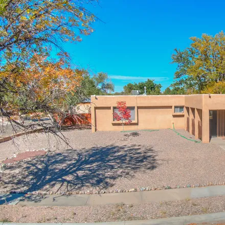 Buy this 4 bed house on 5217 College Heights Drive Northwest in Albuquerque, NM 87120