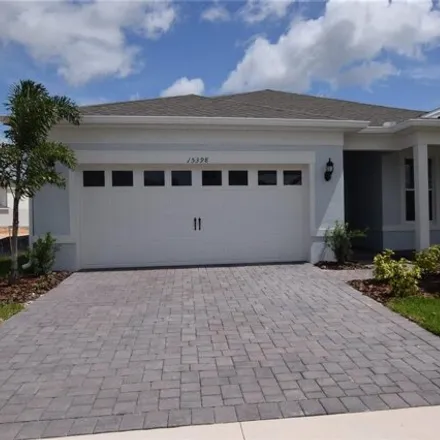 Rent this 4 bed house on 15398 Blue Spruce Drive in Lake County, FL 34756