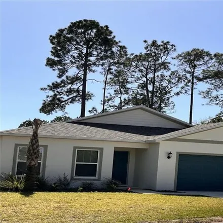 Rent this 4 bed house on 98 Potwood Place in Palm Coast, FL 32164