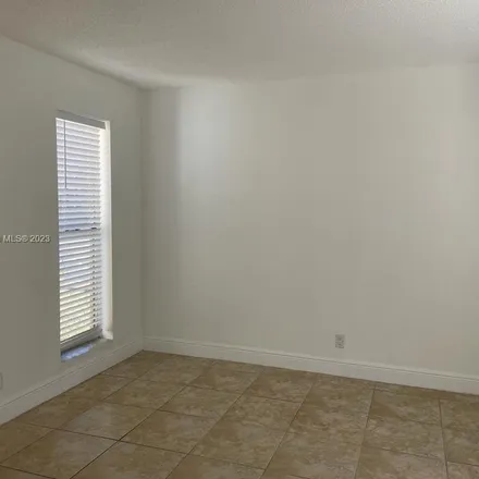 Rent this 3 bed apartment on 4449 Treehouse Lane in Tamarac, FL 33319