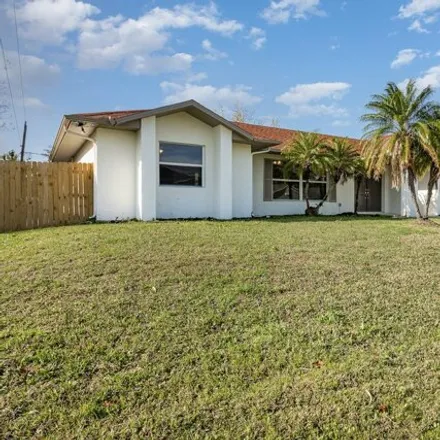 Image 3 - 1677 Ashboro Circle Southeast, Palm Bay, FL 32909, USA - House for sale