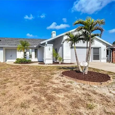 Buy this 3 bed house on 801 West Ellicott Circle in Port Charlotte, FL 33952