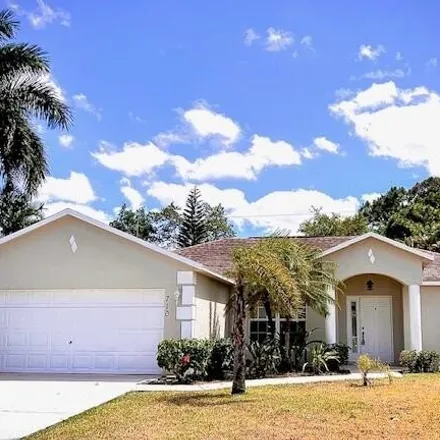 Buy this 3 bed house on 714 Southeast Lighthouse Avenue in Port Saint Lucie, FL 34983