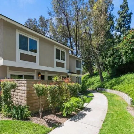 Buy this 3 bed condo on 5488 Willow Woods Lane in Anaheim, CA 92807