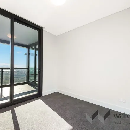 Rent this 1 bed apartment on Opal Tower in 1 Brushbox Street, Sydney Olympic Park NSW 2127