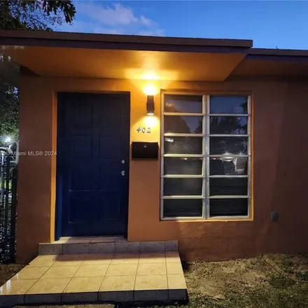 Rent this 3 bed house on 400 Northeast 142nd Street in Shady Oaks Trailer Park, North Miami