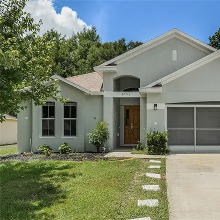 Buy this 4 bed house on 30718 Pga Drive in Lake County, FL 32776