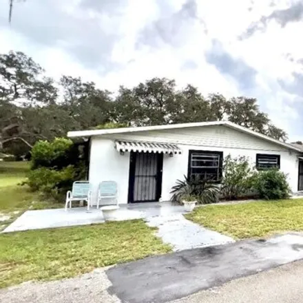 Buy this 4 bed house on 781 Grove Drive in Polk County, FL 33830