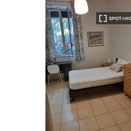 Rent this 4 bed room on Via Oglio in 00198 Rome RM, Italy