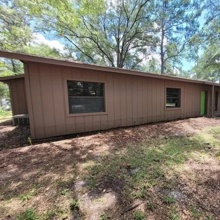 Rent this 3 bed house on 1921 Northwest 42nd Avenue in Gainesville, FL 32605