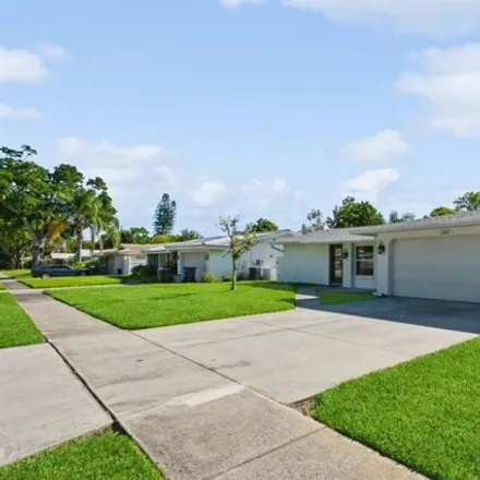 Buy this 3 bed house on 1261 Overcash Drive in Dunedin, FL 34698