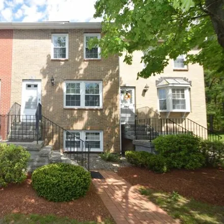 Buy this 2 bed townhouse on 143 Derryfield Court in Manchester, NH 03104