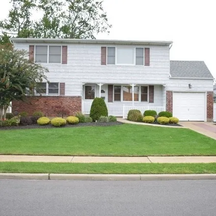 Buy this 4 bed house on 22 Meadowwood Lane in South Farmingdale, NY 11735