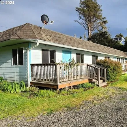 Buy this 3 bed house on 1704 NW 26th St in Lincoln City, Oregon