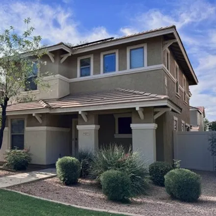 Buy this 4 bed house on 5825 East Harmony Avenue in Mesa, AZ 85206
