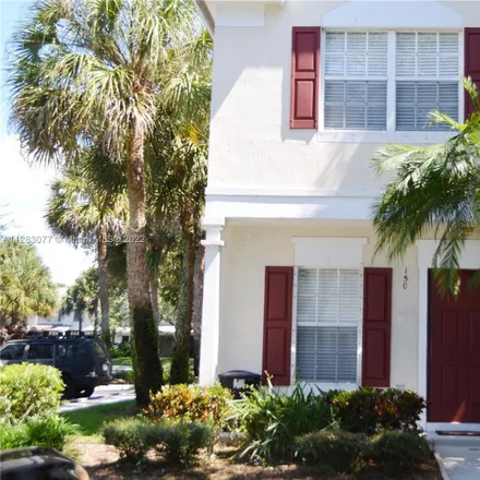 Rent this 2 bed townhouse on 150 Southwest 96th Terrace in Plantation, FL 33324