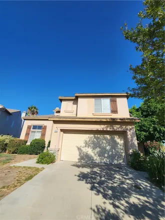 Rent this 4 bed house on 14911 Hillstone Avenue in Fontana, CA 92336