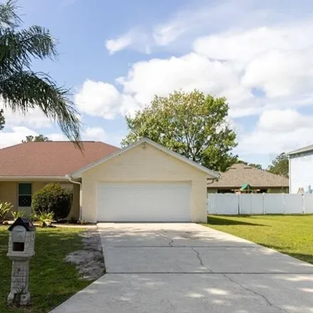 Buy this 3 bed house on 49 Buttonworth Drive in Palm Coast, FL 32137