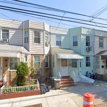 Buy this 4 bed house on 65-11 Admiral Avenue in New York, NY 11379