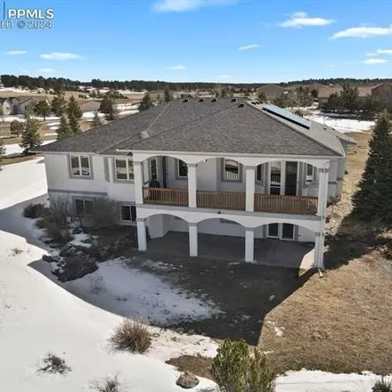 Buy this 6 bed house on 7400 Crow Court in El Paso County, CO 80908