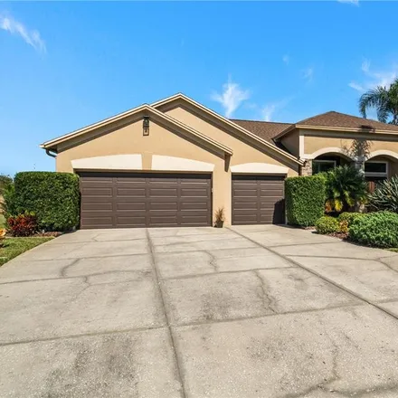 Buy this 4 bed house on 8447 Prestwick Place in Trinity, FL 34655