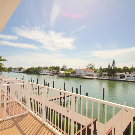 Rent this 2 bed apartment on 7950 Tatum Waterway Drive in Miami Beach, FL 33141