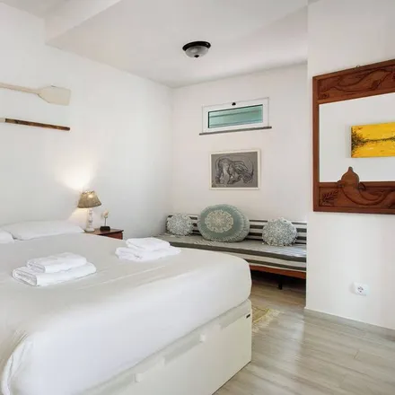 Rent this 2 bed house on Cemitério do Arco da Calheta in Amoreiras, Calheta