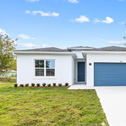 Buy this 4 bed house on 484 Harrison Street Southwest in Palm Bay, FL 32908