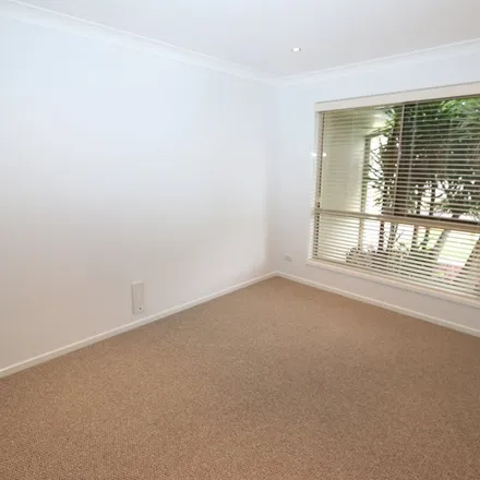 Rent this 4 bed apartment on Stringybark Drive in Molendinar QLD 4214, Australia