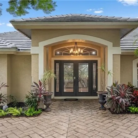 Rent this 4 bed house on 28355 Del Lago Way in Preserve at Woods Edge, Bonita Springs