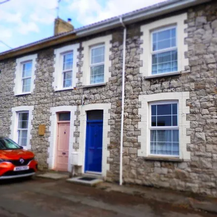 Rent this 3 bed townhouse on Honeysuckle cottage in Lower North Street, Cheddar