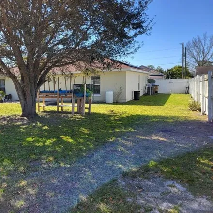 Buy this 3 bed house on 701 Leonardo Court in Poinciana, FL 34758