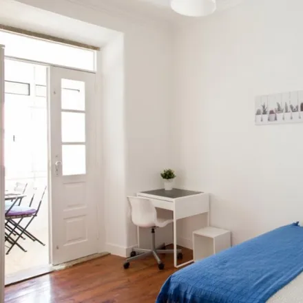 Rent this 4 bed room on Avenida Almirante Reis 126 in 1150-023 Lisbon, Portugal