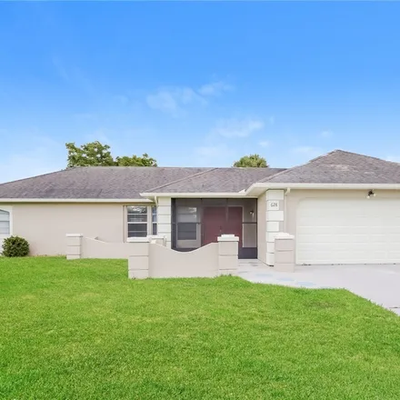 Rent this 3 bed house on 628 Grandview Drive in Lehigh Acres, FL 33936