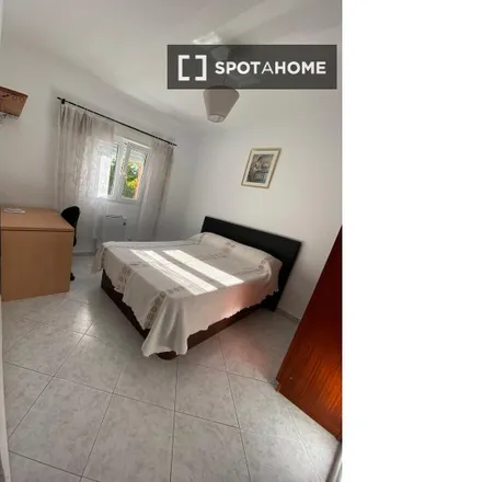 Rent this 2 bed room on Madrid in Calle del Río Henares, 12