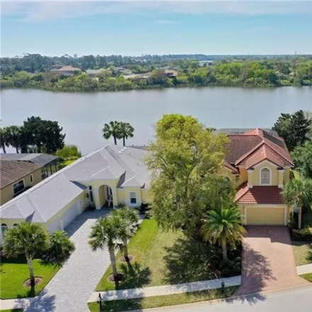 Buy this 4 bed house on 24 Emerald Lake Drive in Flagler County, FL 32137