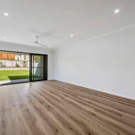 Rent this 3 bed apartment on Phar Lap Circuit in Thrumster NSW 2444, Australia