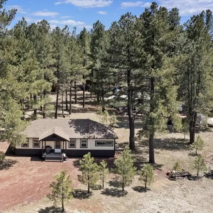 Buy this 3 bed house on 7148 Jolly Rogue Lane in Sherwood Forest Estates, Coconino County