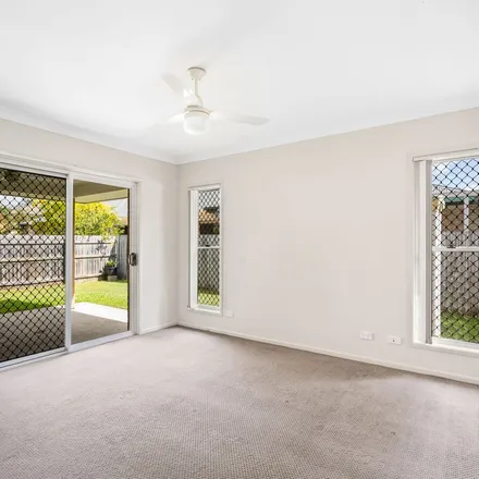 Rent this 4 bed apartment on 42 Highbridge Circuit in Carseldine QLD 4034, Australia