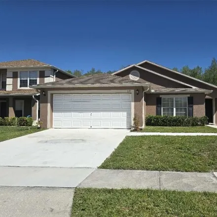 Rent this 3 bed house on 998 Windrose Drive in Orange County, FL 32824