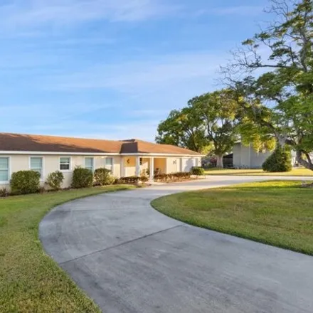 Buy this 4 bed house on 3014 East Lake Hartridge Drive in Winter Haven, FL 33881