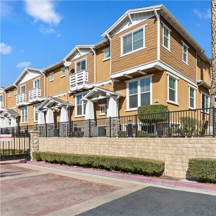 Rent this 3 bed townhouse on 1946 Oakwood Way in Pomona, CA 91767
