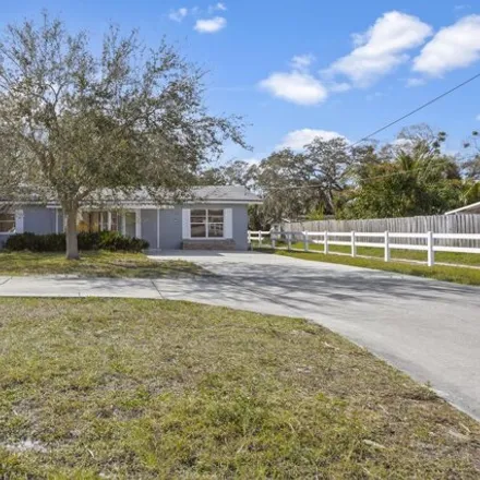 Buy this 4 bed house on 1509 Stewart Avenue in Melbourne, FL 32935