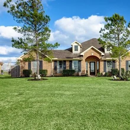 Buy this 4 bed house on 28025 Palm Breeze Lane in Brazoria County, TX 77583