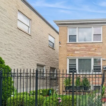 Rent this 3 bed house on 3417 N Damen Ave Unit 2 in Chicago, Illinois