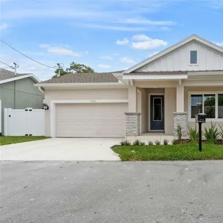 Buy this 4 bed house on 1033 Milwaukee Avenue in Dunedin, FL 34698