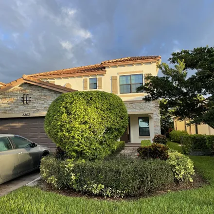 Rent this 5 bed house on 7594 Meed Drive in Palm Beach National, Palm Beach County