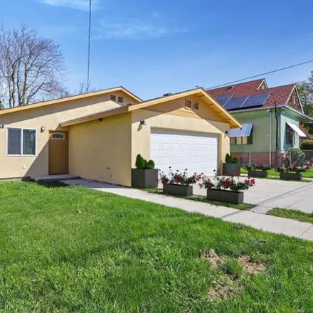 Buy this 7 bed house on 223 East Jefferson Street in The Homestead, Stockton