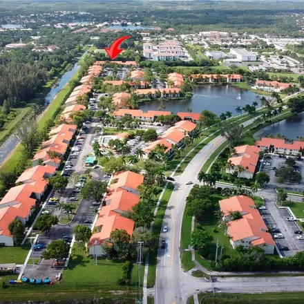 Rent this 2 bed condo on Benoist Farms Elementary School in Balfour Point Drive, Palm Beach County